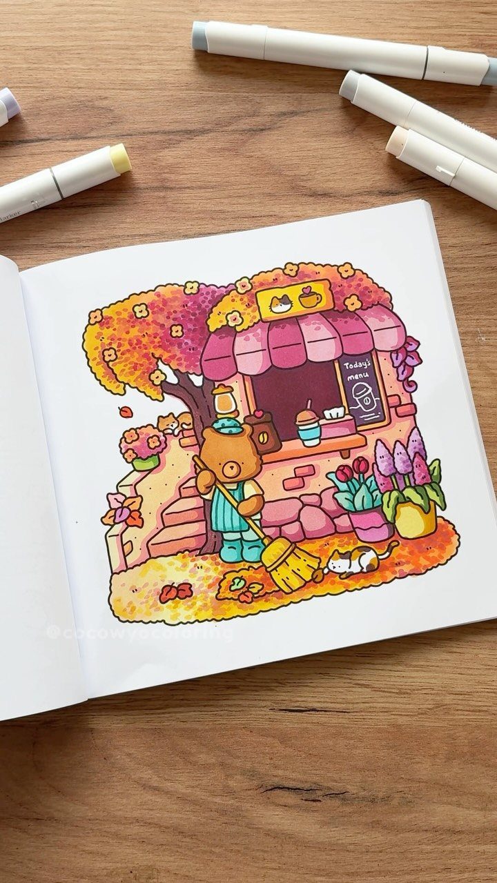 15 Coffee Drinker Gifts: Candles, Mugs, Roasters and More 14 Colored illustration of a bear at a coffee shop in an open book.