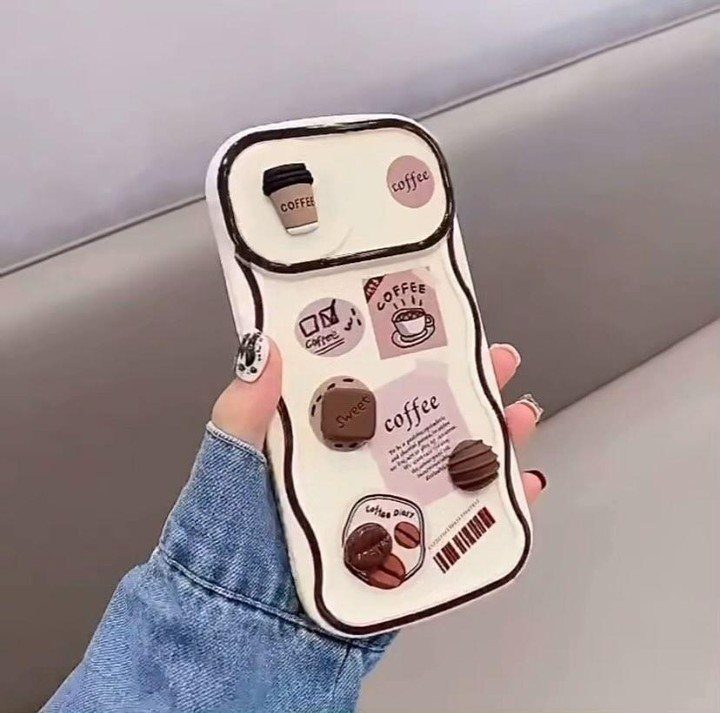 15 Coffee Drinker Gifts: Candles, Mugs, Roasters and More 15 White phone case with 3D coffee beans, a tiny cup, and coffee stickers.