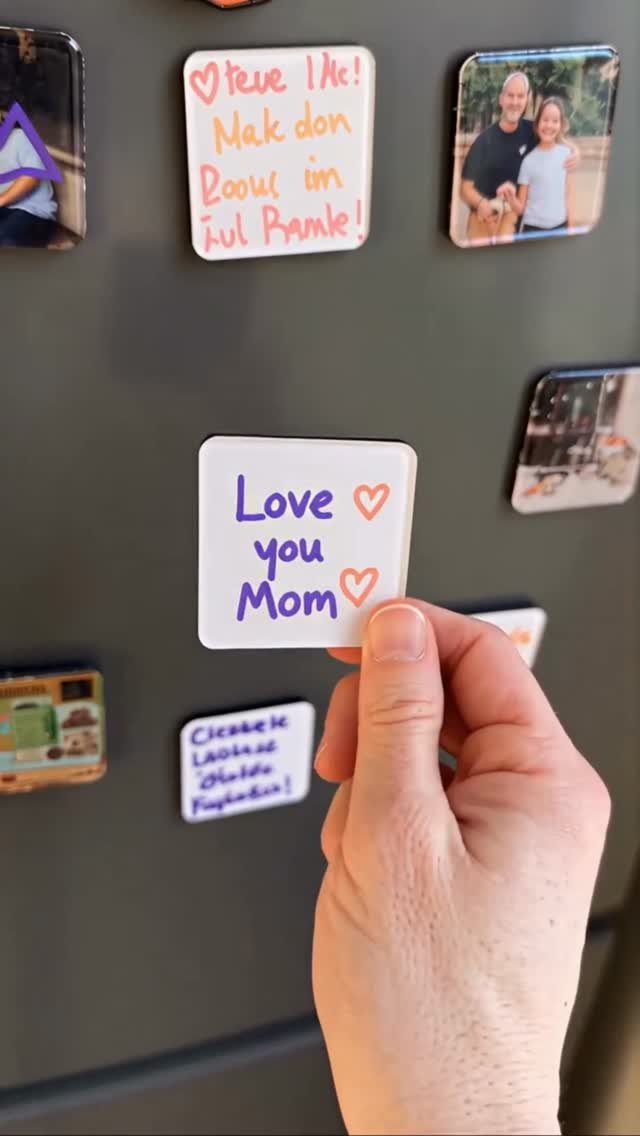 21 Cool Gifts for Adults: Practical Picks for 2026 8 Hand holding a white fridge magnet that says Love you Mom with hearts