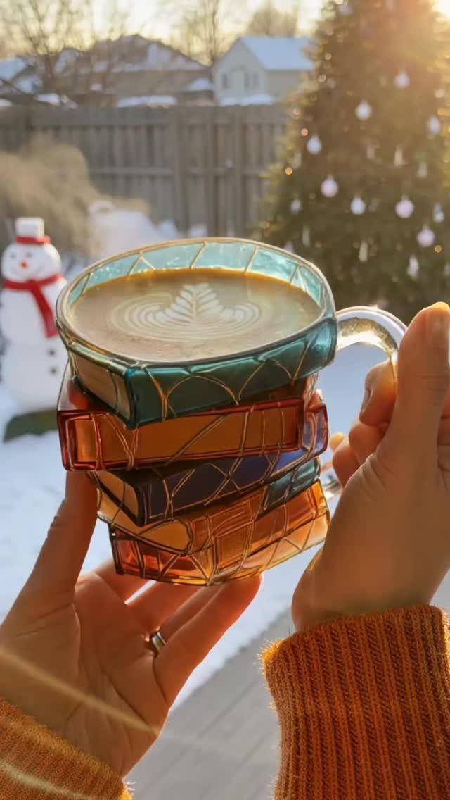 21 Cool Gifts for Adults: Practical Picks for 2026 20 Stacked colorful geometric glass mugs with a latte in a snowy winter setting