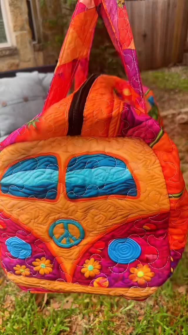 21 Cool Gifts for Adults: Practical Picks for 2026 18 Colorful quilted hippie van handbag with peace sign sitting on green grass