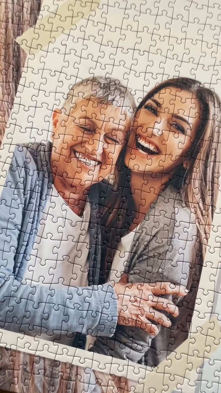21 Cool Gifts for Adults: Practical Picks for 2026 3 Jigsaw puzzle featuring a photo of a smiling man and woman hugging.