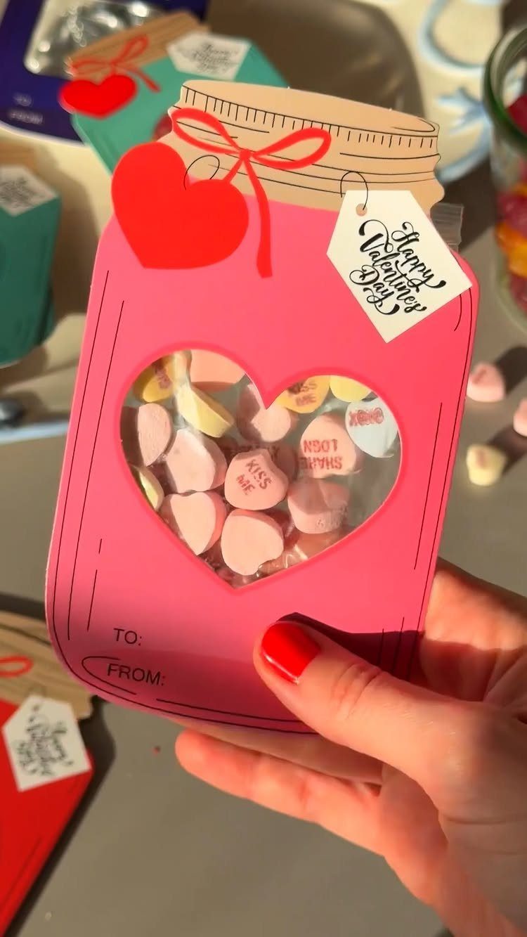 13 Easy Gifts for Neighbors You Can Make or Bake 10 Pink mason jar shaped paper sleeve filled with heart candies for Valentine's Day