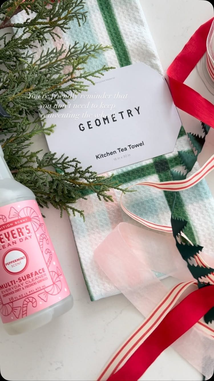13 Easy Gifts for Neighbors You Can Make or Bake 5 Cleaning supplies and a kitchen towel arranged as a gift with ribbons.