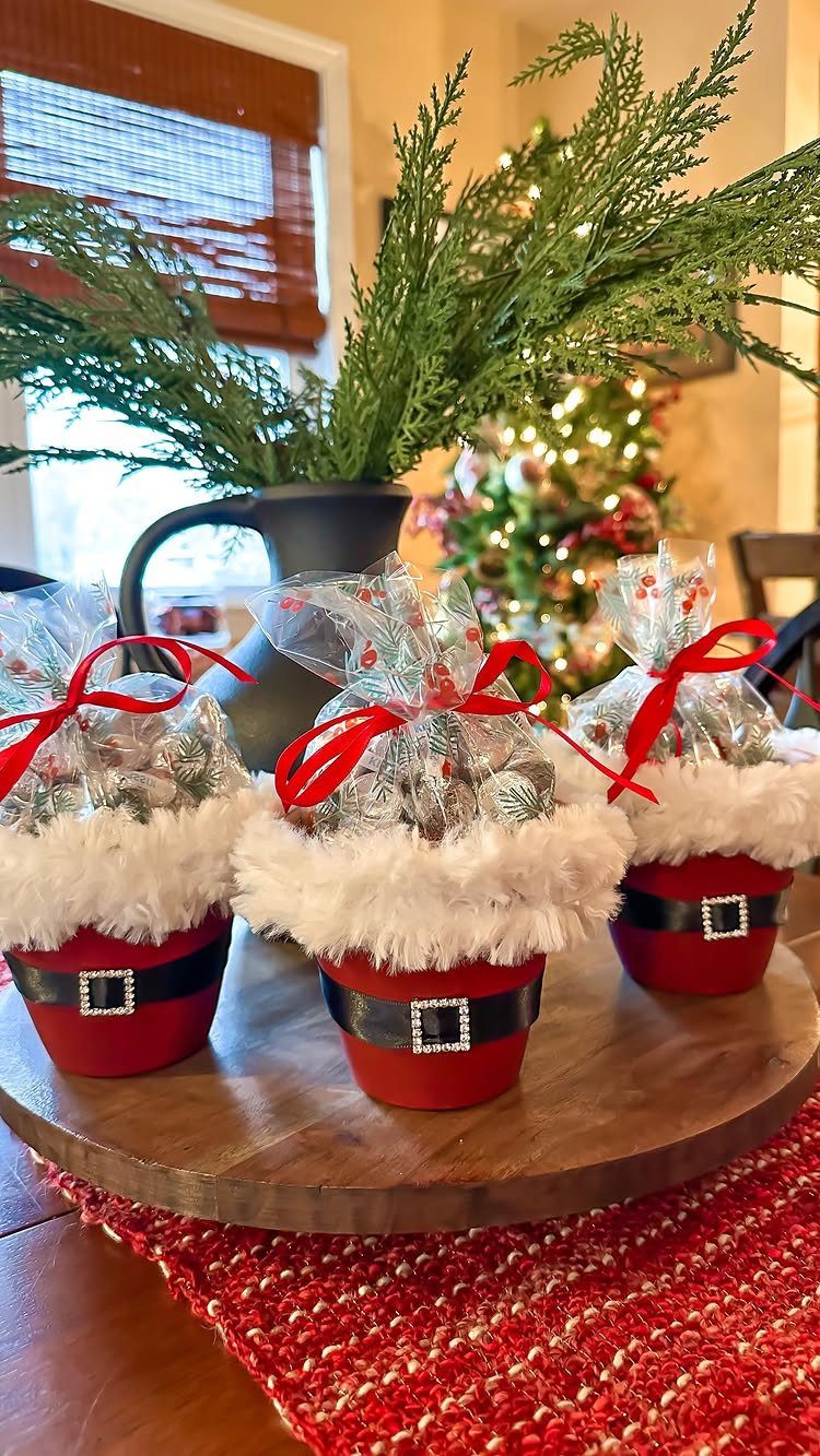 13 Easy Gifts for Neighbors You Can Make or Bake 7 Santa trouser themed candy containers with red ribbons on a wooden platter
