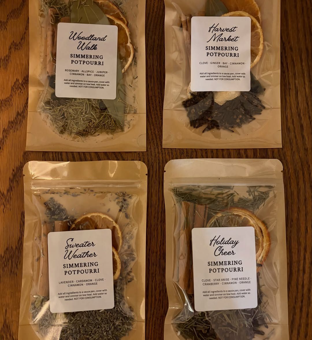 13 Easy Gifts for Neighbors You Can Make or Bake 4 Four pouches of simmering potpourri with dried fruit and spices on wood.