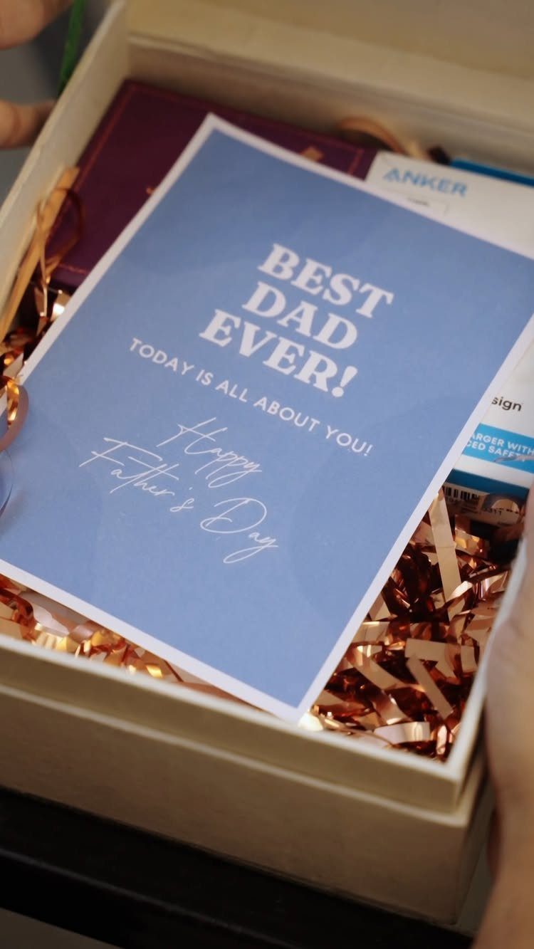 Gift box with a Best Dad Ever card and Anker branded electronics