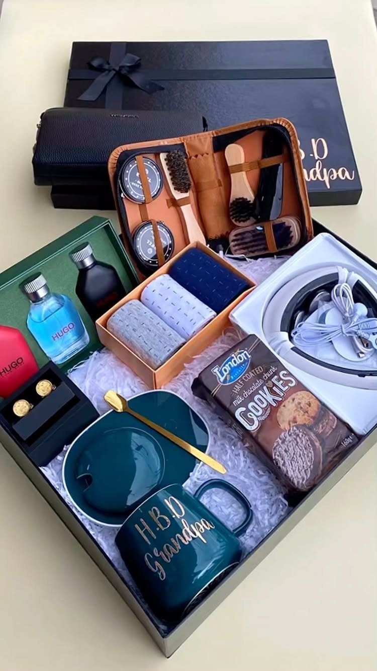 6 Gifts for Grandpa Who Has Everything: Personal Picks 1 Gift box for grandpa with a personalized mug, grooming kit, and headphones.