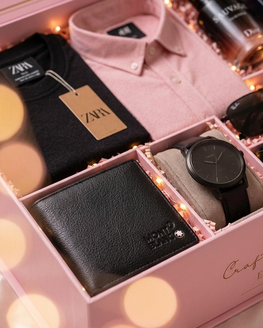 Curated gift box for men with clothing, wallet, watch, and luxury perfume.