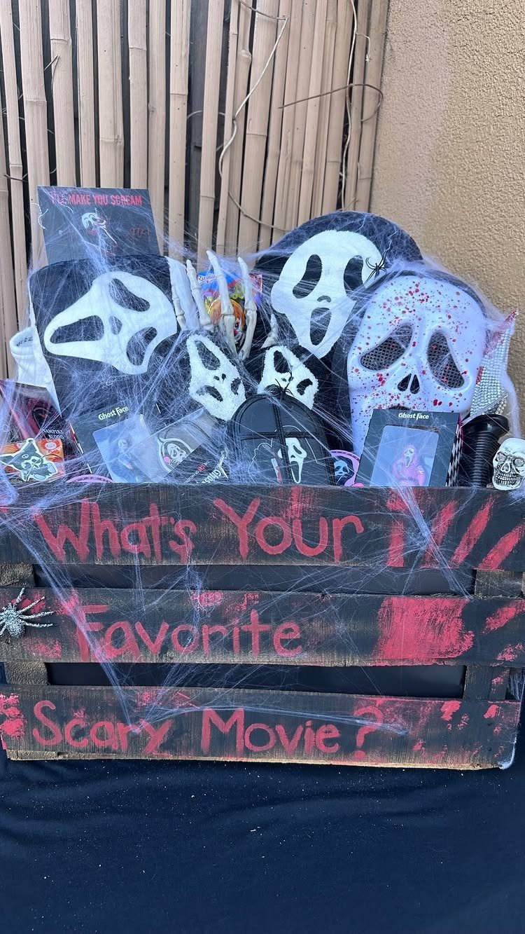 Scream movie themed gift basket in a wooden crate with Ghostface masks