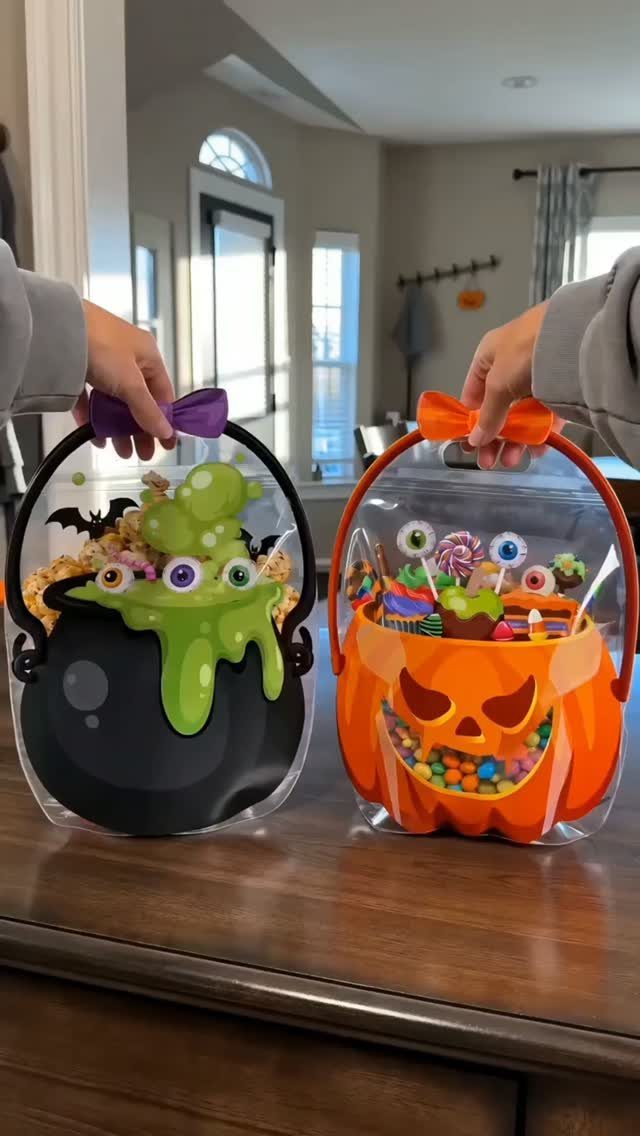 Halloween Teacher Gifts: 10 Ideas Teachers Will Like 4 Two clear Halloween candy bags, one cauldron and one pumpkin, filled with treats.