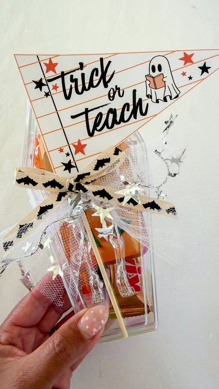Halloween Teacher Gifts: 10 Ideas Teachers Will Like 9 Halloween teacher gift box with Trick or Teach tag and bat ribbon.
