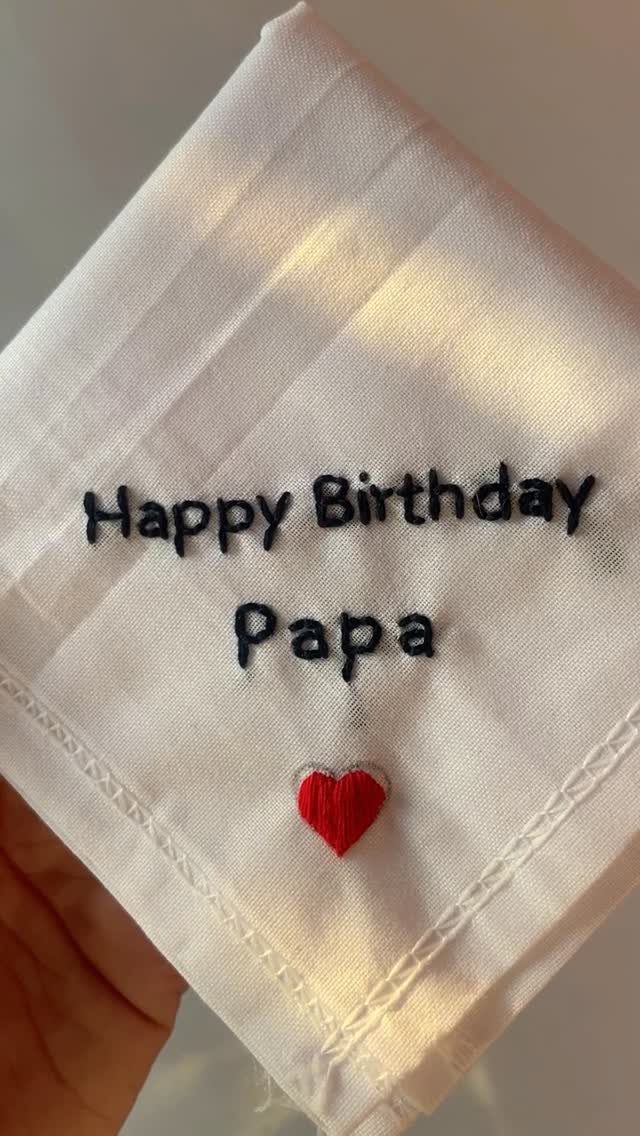 6 Last Minute Birthday Gifts for Dad He'll Actually Use 6 White handkerchief with black embroidered Happy Birthday Papa text and a red heart.
