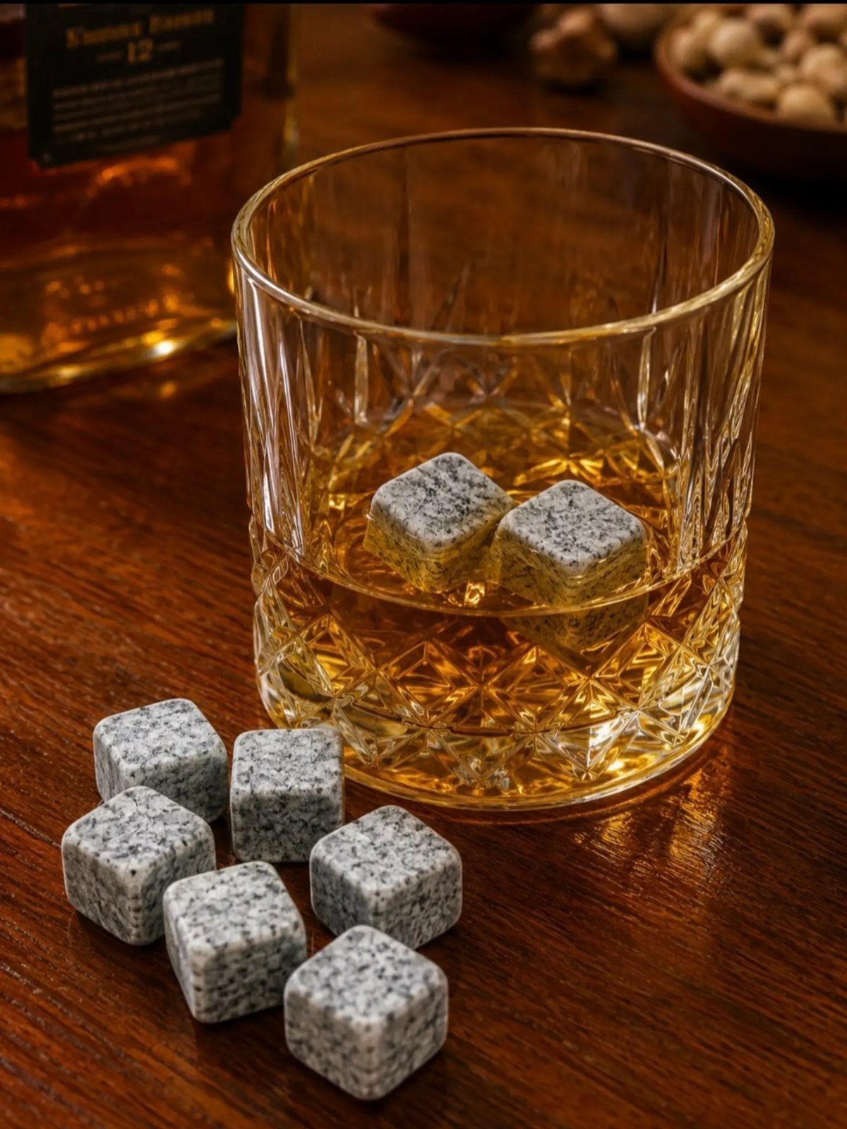 6 Last Minute Birthday Gifts for Dad He'll Actually Use 3 Whiskey glass with stone cooling cubes on a dark wooden table