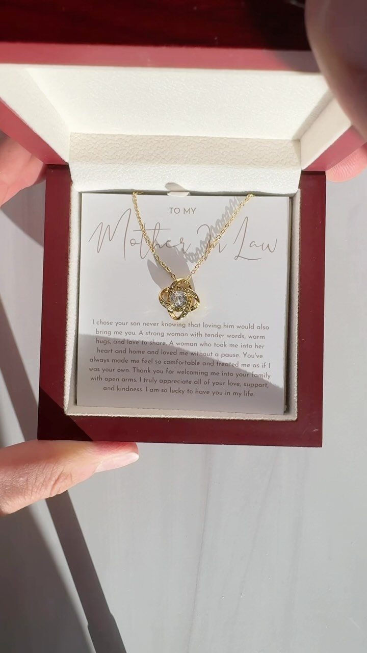 11 Mother in Law Birthday Gift Ideas She Will Actually Use 7 Gold flower pendant necklace in a red box with a message card.