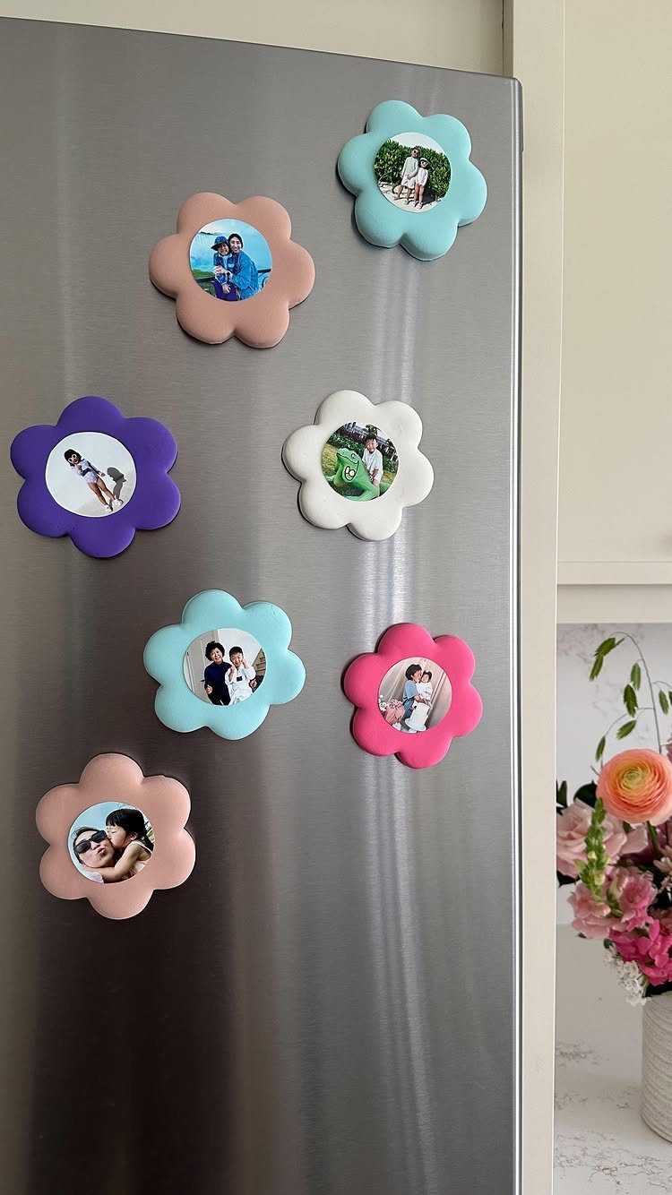 18 Mothers Day Gifts to Make: Easy Handmade Ideas for Mom 8 Flower-shaped photo magnets in various colors attached to a stainless steel refrigerator door.