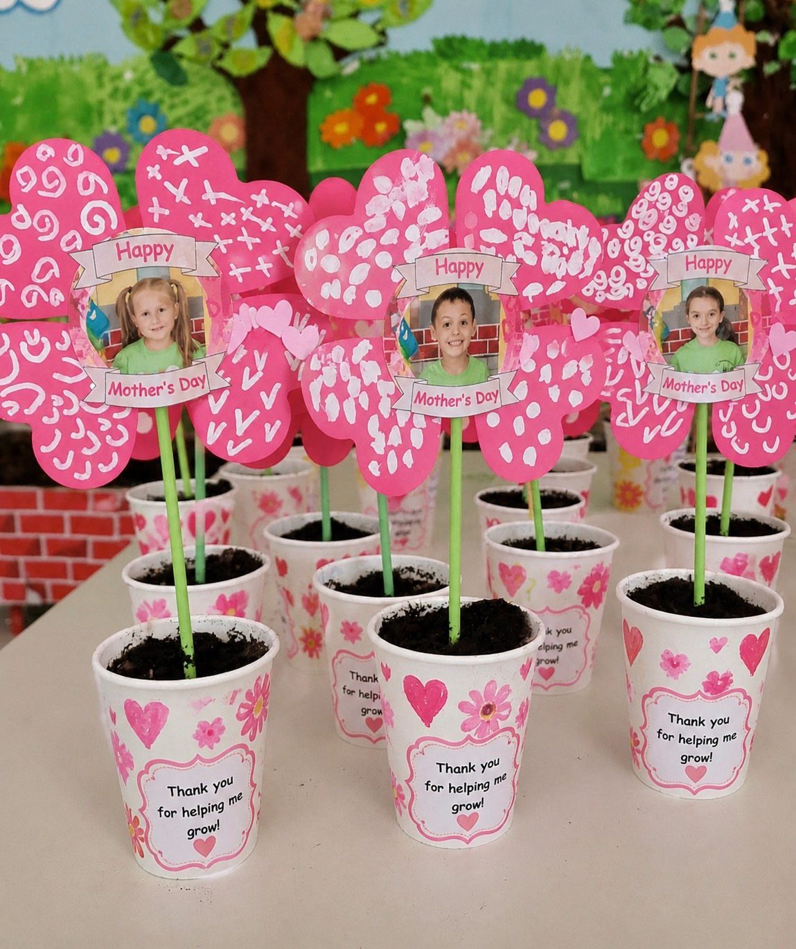 18 Mothers Day Gifts to Make: Easy Handmade Ideas for Mom 7 Small white paper cup planters with pink heart-shaped photo toppers for Mother's Day.