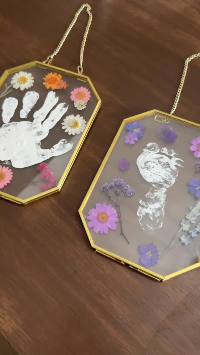 18 Mothers Day Gifts to Make: Easy Handmade Ideas for Mom 9 Hexagonal gold glass frames containing white paint handprints and colorful pressed flowers.