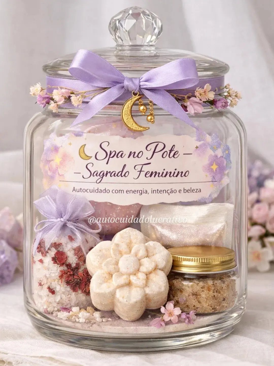 11 Spa Day Gift Basket Ideas for Relaxing at Home 5 Glass jar spa gift set with flower soap, bath salts, and purple ribbon.