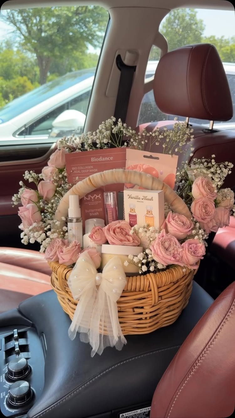 Spa Gift Basket Ideas: 8 Picks for Relaxing at Home 6 Wicker gift basket with pink roses and beauty products inside a car