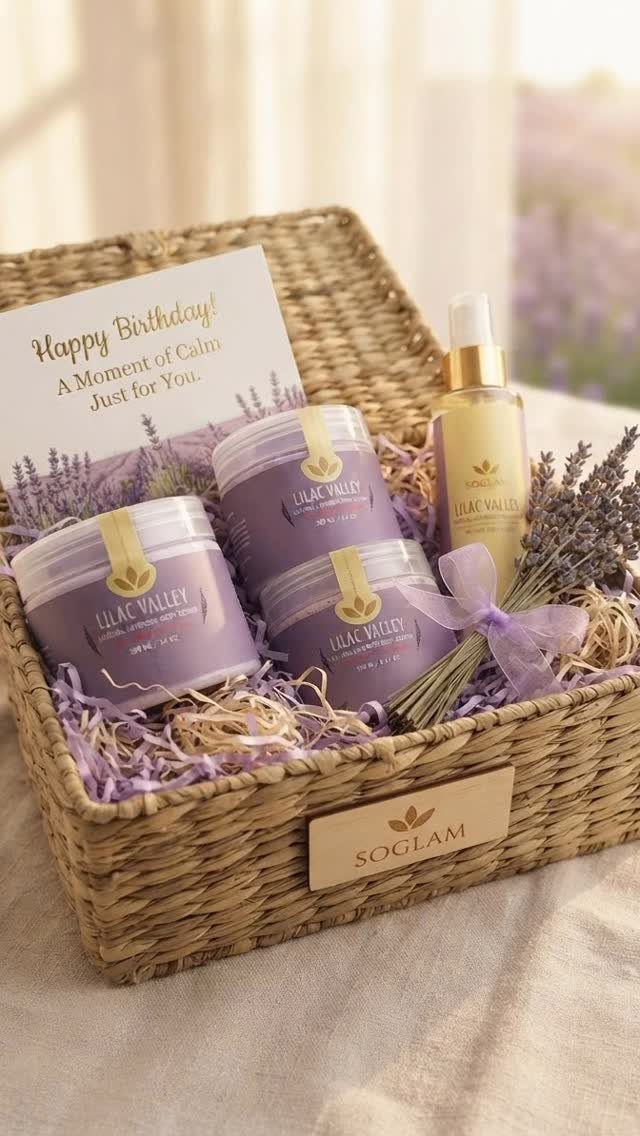 Spa Gift Basket Ideas: 8 Picks for Relaxing at Home 1 Woven gift basket with purple skincare jars, gold bottle, and dried lavender sprigs.